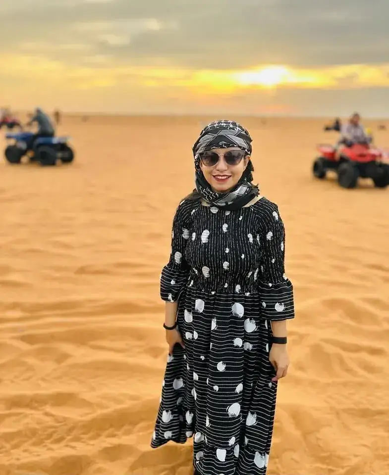 Afshana Diya in the desert dunes at sunset