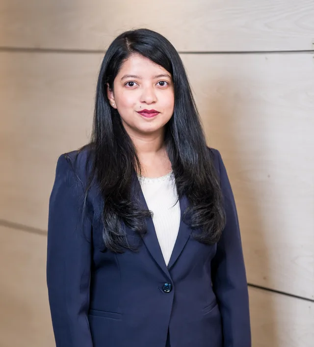 Afshana Diya in a navy blazer