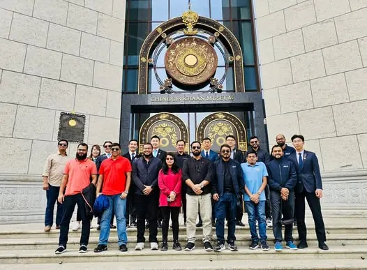 The JCI Dhaka Founders team on the steps of the Genghis Khan Museum