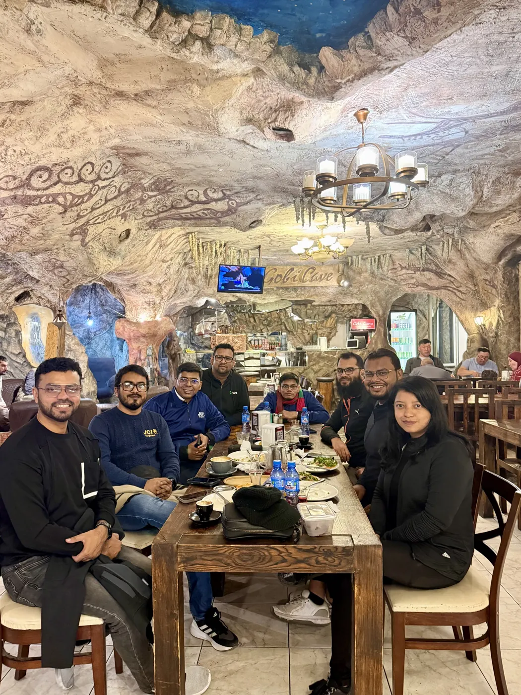 The JCI Dhaka Founders team at a long table inside Gobi Cave Turkish Restaurant