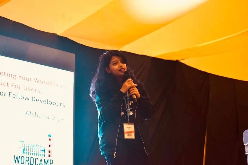 Afshana Diya speaking on stage at WordCamp Iloilo 2019